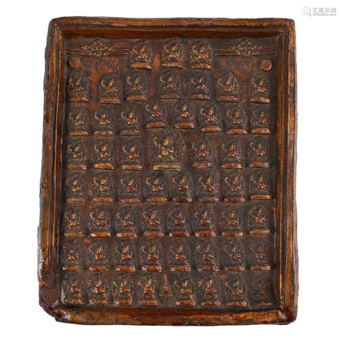 TZA TZA CLAY TABLET TIBET, 19TH CENTURY 18.5cm wide, 22cm high