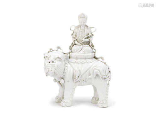 A blanc-de-chine model of Guanyin upon a mythical beast,20th century
