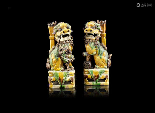 A pair of sancai-glazed Buddhist lion-shaped incense holders,Kangxi