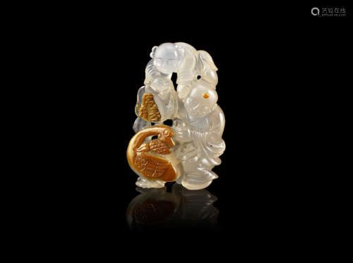 A translucent and russet agate 'boys' group,19th/20th century