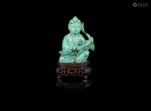 A small turquoise matrix figure of a Buddhist acolyte,18th/19th century