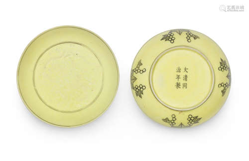 A rare pair of yellow-ground incised 'dragon' saucer dishes,Tongzhi six-character marks and of the period