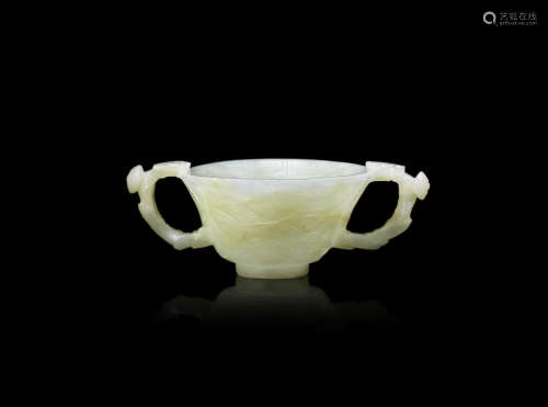 A pale green jade 'prunus' cup,Late Ming Dynasty