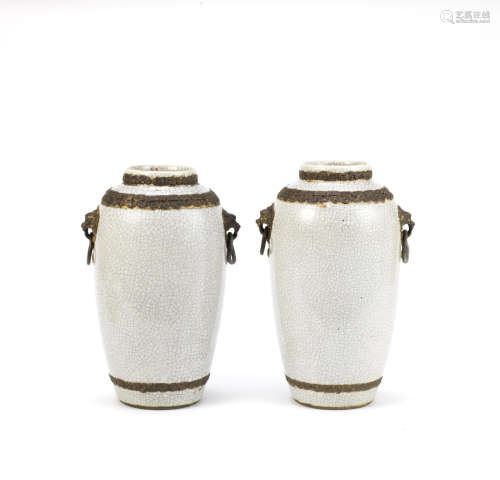 A pair of crackle-glazed and imitation-bronze baluster vases,Kangxi