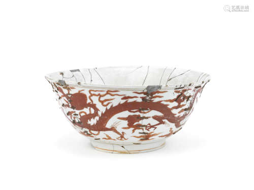 A rare large iron-red enamelled 'dragon' bowl,Jiajing six-character mark and of the period