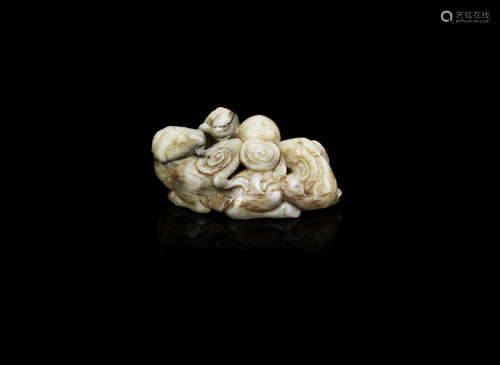 A mottled cream jade 'san yang' group,17th century