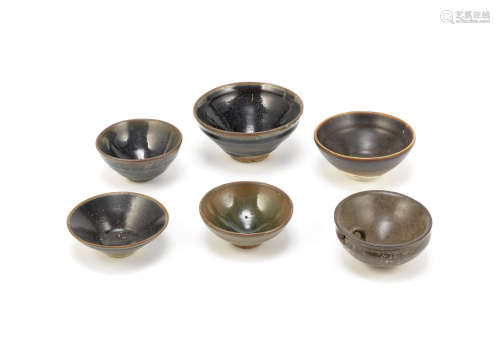 A group of six various brown and black glazed bowls and a warming vessel,Song Dynasty