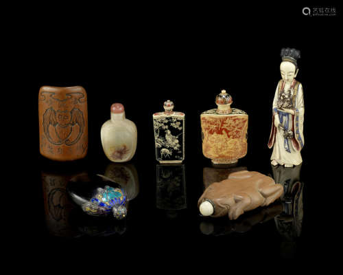 Six organic material snuff bottles; and a bamboo wrist rest,19th/20th century