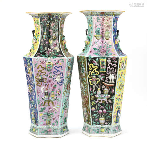 A pair of famille rose 'precious objects' lozenge-form baluster vases,19th century