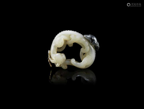 A pale green and grey jade reticulated 'dragon and rat' carving,18th/19th century