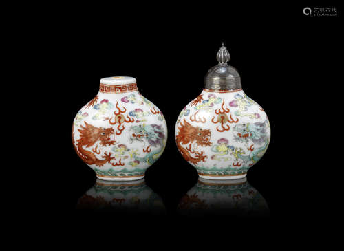 A pair of famille rose 'confronting dragons' snuff bottles,Guangxu six-character marks and probably of the period