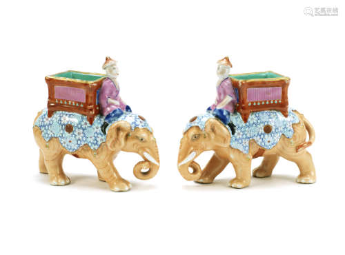 A pair of unusual famille rose models of caparisoned elephants,Late Qing Dynasty