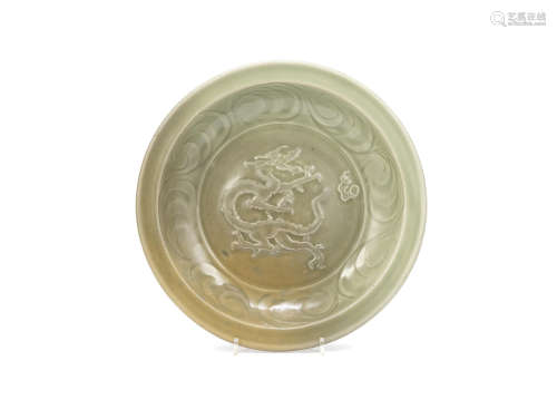 A moulded Longquan celadon 'dragon' dish,Yuan/early Ming Dynasty