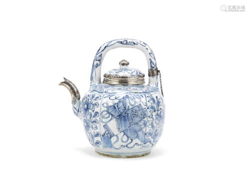 A blue and white lobed pencil-drawn teapot and cover with silver mounts,Wanli