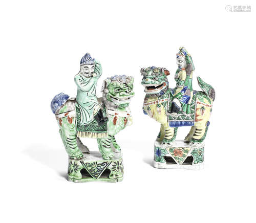 A pair of famille verte biscuit models of foreigners and beasts,Kangxi