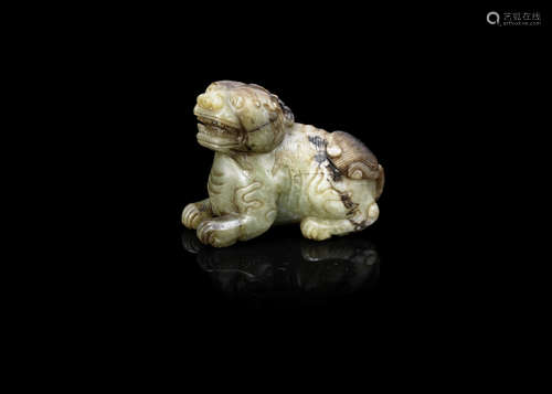 A mottled green jade carving of a mythical beast