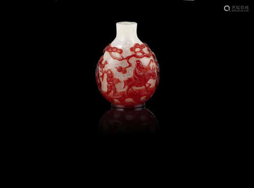 A red overlay glass 'three friends' snuff bottle,19th century