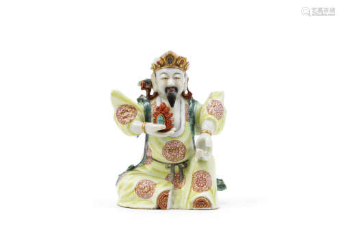 A famille rose 'Minister of the Treasury' figure,Qianlong