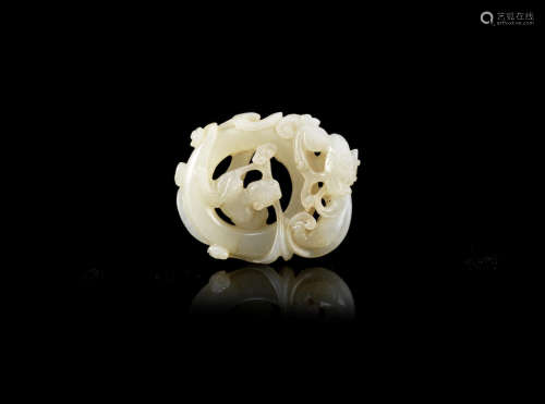 A white jade reticulated carving of chilong