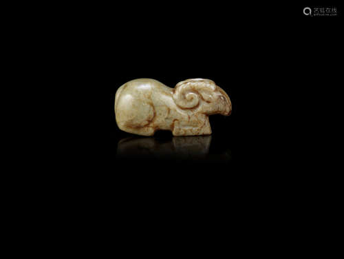 A pale green and russet jade carving of a recumbent ram,Six Dynasties/Song Dynasty