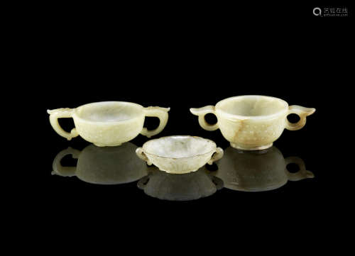 Two pale green jade two-handled cups; and a Mughal-style jade cup,Ming Dynasty