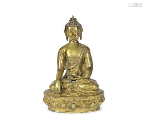 A gilt bronze figure of Sakyamuni