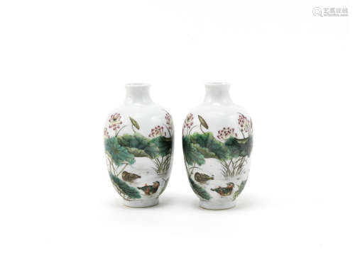 A pair of famille rose baluster vases,Qianlong seal mark, 20th century