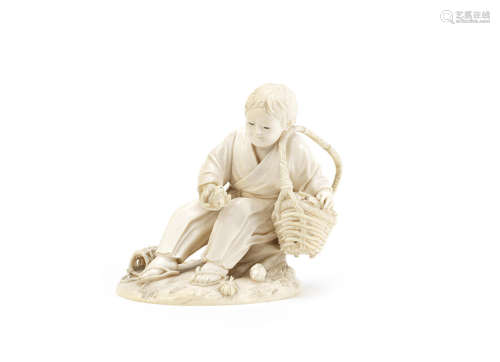 A Tokyo School ivory okimono of a boy,Meiji Period