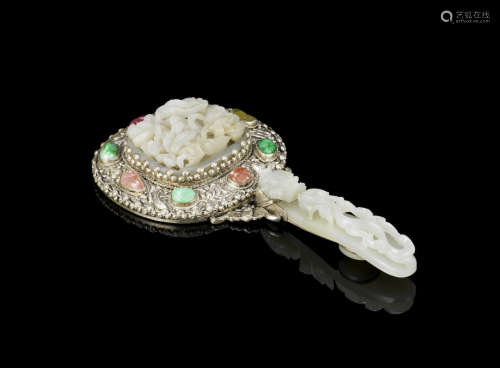 A silver hand mirror with reticulated jade inset plaque and dragon hook handle,The jade Ming Dynasty and later, the silver late Qing Dynasty
