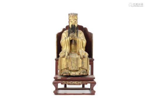 A giltwood seated figure of a scholar official,18th Century