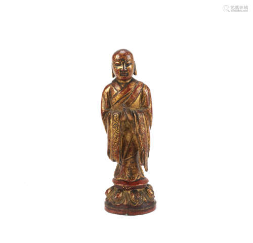A gilt-lacquered bronze figure of Ananda,Late Ming Dynasty