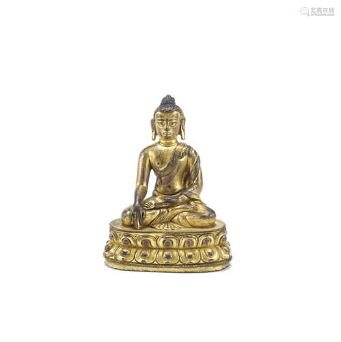 A gilt-bronze figure of Buddha,15th century