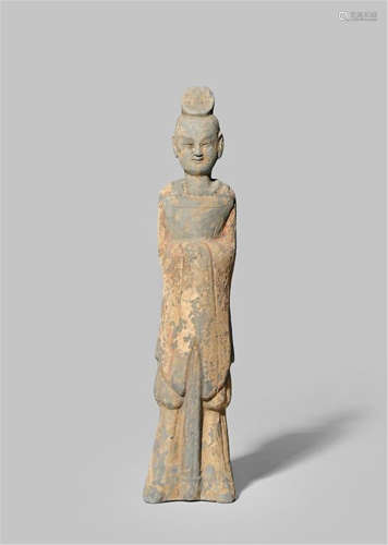 A CHINESE POTTERY FIGURE OF AN OFFICIAL NORTHERN WEI DYNASTY 386-535 AD