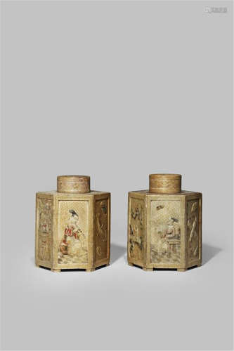 A PAIR OF CHINESE HEXAGONAL-SECTION SOAPSTONE TEA CANISTERS AND COVERS FIRST HALF 18TH CENTURY