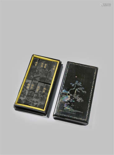 A SET OF EIGHT CHINESE BLACK INK STICKS IN A FITTED LACQUERED BOX EARLY 19TH CENTURY