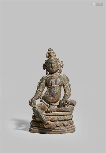 AN INDIAN GILT COPPER/BRONZE MODEL OF KUBERA C.10TH CENTURY