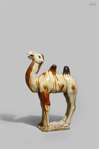 A CHINESE POTTERY FIGURE OF A BACTRIAN CAMEL TANG DYNASTY 618-907 AD