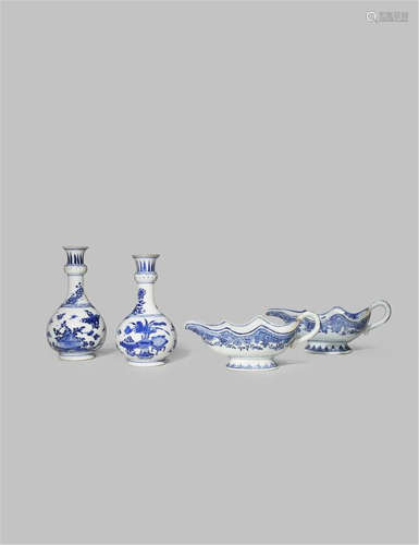 A NEAR PAIR OF CHINESE BLUE AND WHITE VASES AND TWO SAUCE BOATS 18TH CENTURY
