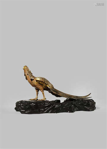 A JAPANESE GILT BRONZE OKIMONO OF A GOLDEN PHEASANT MEIJI 1868-1912