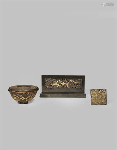 A CHINESE RECTANGULAR RETICULATED IRON 'DRAGON' PLAQUE MING DYNASTY