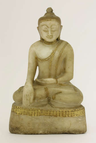 A carved white marble figure