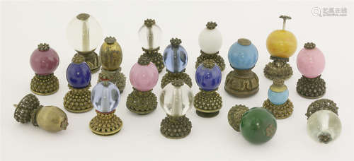 A collection of hat finials