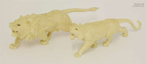 A Japanese ivory lion and lioness