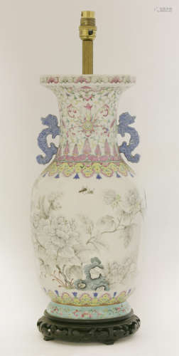 清十九世纪末 粉彩堆白洞石花卉纹螭龙耳瓶
