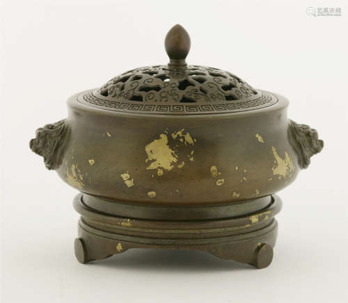 A bronze incense burner