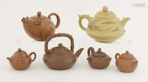 A collection of Yixing teapots