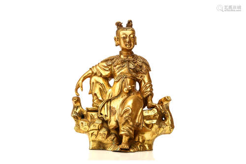 18/19世纪   铜鎏金人物坐像                                                                                                                                                A CHINESE GILT BRONZE SEATED FIGURE.