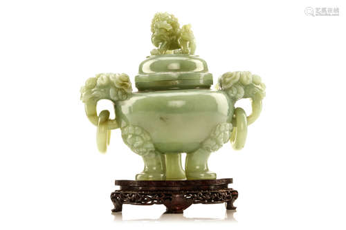 20世纪   玉雕双耳盖炉                                                                                                                                                   A CHINESE CARVED JADE TRIPOD CENSER AND COVER.