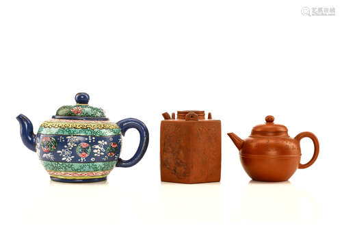 宜兴紫砂壶三把，款：「王南林制」、「陈光明」、「邵顺昌制」 THREE CHINESE YIXING ZESHA TEAPOTS AND COVERS.