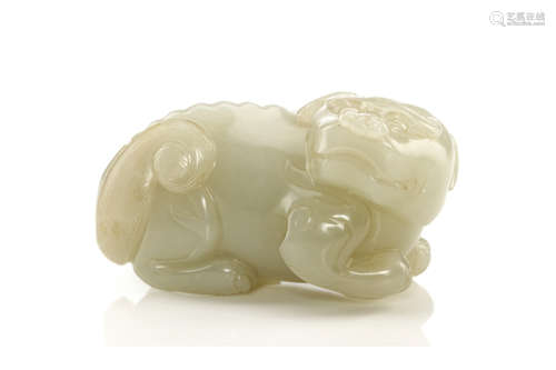 佛狮玉雕                                                                                                                                                          A CHINESE JADE LION.